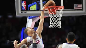 December 17, 2014; Los Angeles, CA, USA; Los Angeles Clippers forward Blake Griffin (32) is fouled on a scoring play by Indiana Pacers forward David West (21) during the second half at Staples Center. Mandatory Credit: Gary A. Vasquez-USA TODAY Sports