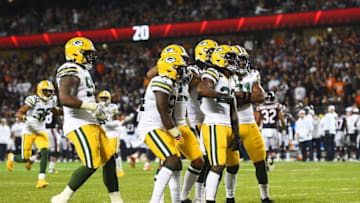 CHICAGO, ILLINOIS - SEPTEMBER 05: Members of the Green Bay Packers defense celebrate an interception during the second half against the Chicago Bears at Soldier Field on September 05, 2019 in Chicago, Illinois. (Photo by Stacy Revere/Getty Images)