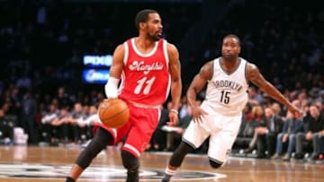 Feb 10, 2016; Brooklyn, NY, USA; Memphis Grizzlies point guard Mike Conley (11) drives against Brooklyn Nets point guard Donald Sloan (15) during the first quarter at Barclays Center. Mandatory Credit: Brad Penner-USA TODAY Sports