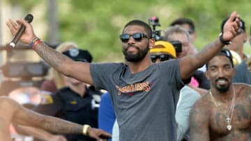 Jun 22, 2016; Cleveland, OH, USA; Cleveland Cavaliers guard Kyrie Irving greets the crowd during the Cleveland Cavaliers NBA championship celebration in downtown Cleveland. Mandatory Credit: Ken Blaze-USA TODAY Sports