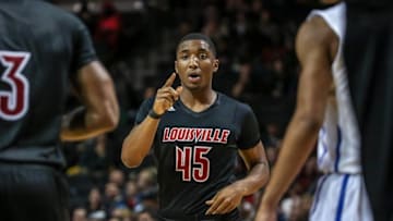 Nov 28, 2015; Brooklyn , NY, USA; Louisville Cardinals guard Donovan Mitchell (45) points in his game against the Saint Louis Billikens at Barclays Center. The Cardinals won, 77-57. Mandatory Credit: Vincent Carchietta-USA TODAY Sports