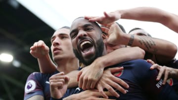7th October 2018, Craven Cottage, London, England; EPL Premier League football, Fulham versus Arsenal; Alexandre Lacazette of Arsenal celebrates scoring his sides 2nd goal in the 49th minute to make it 1-2 with Henrikh Mkhitaryan, Hector Bellerin and Danny Welbeck of Arsenal (photo by John Patrick Fletcher/Action Plus via Getty Images)