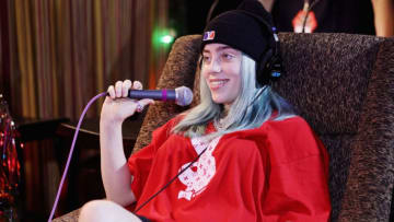 INGLEWOOD, CA - DECEMBER 09: Billie Eilish speaks during an interview at KROQ Absolut Almost Acoustic Christmas at The Forum on December 9, 2018 in Inglewood, California. (Photo by Rich Polk/Getty Images for KROQ/Entercom)