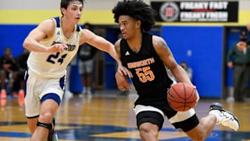 Ensworth's Skyy Clark (55) advances with Brentwood's Macen Redner (24) during the second quarter at Brentwood High School in Brentwood, Tenn., Thursday, Nov. 19, 2020.Bhs Ehs Bbb 111920 An 014