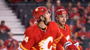 CALGARY, AB - APRIL 19: Calgary Flames Defenceman Travis Hamonic (24) checks the scoreboard during the third period of Game Five of the Western Conference First Round during the 2019 Stanley Cup Playoffs where the Calgary Flames hosted the Colorado Avalanche on April 19, 2019, at the Scotiabank Saddledome in Calgary, AB. (Photo by Brett Holmes/Icon Sportswire via Getty Images)