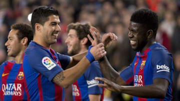 BARCELONA, SPAIN - MARCH 4: Samuel Umtiti (R) of Barcelona celebrating his score with Luis Suarez (L) during La Liga match between the FC Barcelona and Celta de Vigo at the Camp Nou Stadium in Barcelona, Spain on March 4, 2017. (Photo by Albert Llop/Anadolu Agency/Getty Images)