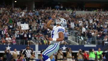 Oct 9, 2016; Arlington, TX, USA; Dallas Cowboys quarterback Dak Prescott (4) points to the sky after scoring a second quarter touchdown against the Cincinnati Bengals at AT&T Stadium. Mandatory Credit: Matthew Emmons-USA TODAY Sports