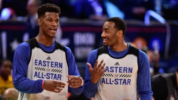 Feb 14, 2015; New York, NY, USA; Eastern Conference guard Jimmy Butler of the Chicago Bulls (21, left) and guard John Wall of the Washington Wizards (2, right) talk during practice at Madison Square Garden. Mandatory Credit: Bob Donnan-USA TODAY Sports