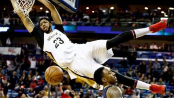 Dec 15, 2016; New Orleans, LA, USA; New Orleans Pelicans forward Anthony Davis (23) dunks over and draws a foul from Indiana Pacers guard Jeff Teague (44) during the fourth quarter of a game at the Smoothie King Center. The Pelicans defeated the Pacers 102-95. Mandatory Credit: Derick E. Hingle-USA TODAY Sports