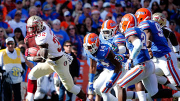 GAINESVILLE, FL - NOVEMBER 30: James Wilder Jr. #32 of the Florida State Seminoles runs for yardage during the game against the Florida Gators on November 30, 2013 in Gainesville, Florida. (Photo by Sam Greenwood/Getty Images)