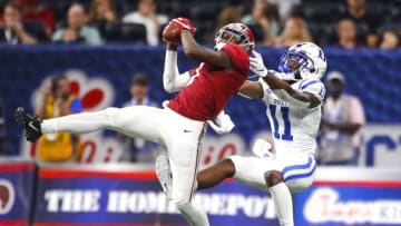 ATLANTA, GA - AUGUST 31: Alabama Crimson Tide defensive back Trevon Diggs (7) makes an interception over Duke Blue Devils wide receiver Scott Bracey (11) in the second half of the Duke Blue Devils v Alabama Crimson Tide game August 31, 2019 at Mercedes-Benz Stadium in Atlanta, GA. (Photo by Todd Kirkland/Icon Sportswire via Getty Images)