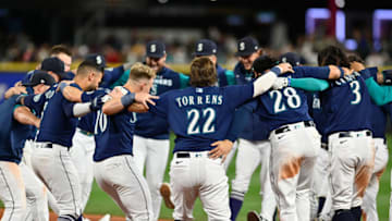 Sep 29, 2022; Seattle, Washington, USA; The Seattle Mariners celebrate after defeating the Texas Rangers at T-Mobile Park. Seattle defeated Texas 10-9. Mandatory Credit: Steven Bisig-USA TODAY Sports