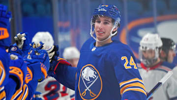 BUFFALO, NY - JANUARY 26: Dylan Cozens #24 of the Buffalo Sabres celebrates his goal against the New York Rangers during the first period at KeyBank Center on January 26 , 2021 in Buffalo, New York. (Photo by Kevin Hoffman/Getty Images)