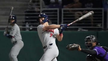 Mar 29, 2022; Phoenix, Arizona, USA; Arizona outfielder Mac Bingham (7) hits a solo home run against Grand Canyon during a game at Grand Canyon baseball park. Mandatory Credit: Michael Chow-Arizona RepublicNcaa Baseball Gcu Baseball Game Arizona At Grand Canyon