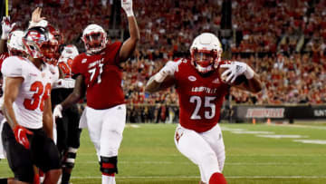 LOUISVILLE, KY - SEPTEMBER 15: Running back Dae Williams #25 of the Louisville Cardinals runs for a touchdown during the fourth quarter of the game against the Western Kentucky Hilltoppers at Cardinal Stadium on September 15, 2018 in Louisville, Kentucky. (Photo by Bobby Ellis/Getty Images)