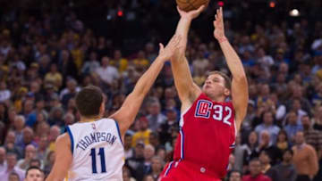 November 4, 2015; Oakland, CA, USA; Los Angeles Clippers forward Blake Griffin (32) shoots the basketball against Golden State Warriors guard Klay Thompson (11) during the fourth quarter at Oracle Arena. The Warriors defeated the Clippers 112-108. Mandatory Credit: Kyle Terada-USA TODAY Sports