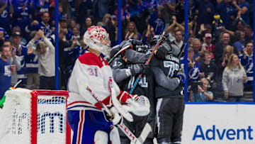TAMPA, FL - DECEMBER 28: The Tampa Bay Lightning celebrate a goal against goalie Carey Price #31 of the Montreal Canadiens during the third period at Amalie Arena on December 28, 2019 in Tampa, Florida (Photo by Mark LoMoglio/NHLI via Getty Images)