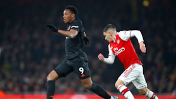 LONDON, ENGLAND - JANUARY 01: Anthony Martial of Manchester United gets away from Lucas Torreira of Arsenal during the Premier League match between Arsenal FC and Manchester United at Emirates Stadium on January 01, 2020 in London, United Kingdom. (Photo by Julian Finney/Getty Images)