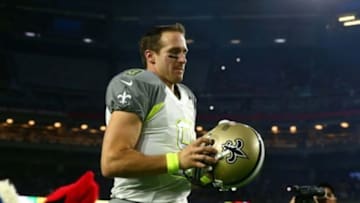 Jan 25, 2015; Phoenix, AZ, USA; Team Carter quarterback Drew Brees of the New Orleans Saints (9) during player introductions before the 2015 Pro Bowl at University of Phoenix Stadium. Mandatory Credit: Mark J. Rebilas-USA TODAY Sports