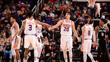 OKC Thunder Trade Deadline: Kelly Oubre Jr. of the Phoenix Suns and Dario Saric of the Phoenix Suns high-five during a game (Photo by Barry Gossage/NBAE via Getty Images)