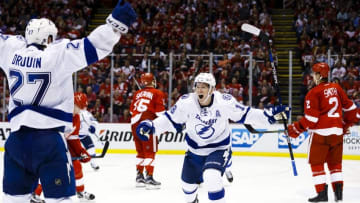 Apr 19, 2016; Detroit, MI, USA; Tampa Bay Lightning left wing Ondrej Palat (18) celebrates his goal during the third period with left wing Jonathan Drouin (27) in game four of the first round of the 2016 Stanley Cup Playoffs against the Detroit Red Wings at Joe Louis Arena. Tampa won 3-2. Mandatory Credit: Rick Osentoski-USA TODAY Sports