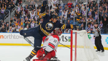 BUFFALO, NY - NOVEMBER 18: Evander Kane #9 of the Buffalo Sabres celebrates his third period goal against Scott Darling #33 of the Carolina Hurricanes during an NHL game on November 18, 2017 at KeyBank Center in Buffalo, New York. Carolina won, 3-1. (Photo by Bill Wippert/NHLI via Getty Images)