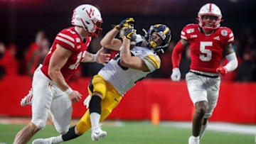 Iowa freshman receiver Nico Ragaini briefly pulls in a pass against Nebraska in the fourth quarter during their Big 10 final season game on Friday, Nov. 29, 2019, at Memorial Stadium in Lincoln, Neb. The catch was later overturned and ruled incomplete after a game official reviewed the play.20191129 Iowafbvsnebraska