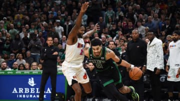 Dec 2, 2022; Boston, Massachusetts, USA; Miami Heat forward Haywood Highsmith (24) guards Boston Celtics forward Jayson Tatum (0) during the second half at TD Garden. Mandatory Credit: Bob DeChiara-USA TODAY Sports