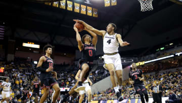 COLUMBIA, MISSOURI - JANUARY 28: Javon Pickett #4 of the Missouri Tigers blocks a shot by Donnell Gresham Jr. #0 of the Georgia Bulldogs during the game at Mizzou Arena on January 28, 2020 in Columbia, Missouri. (Photo by Jamie Squire/Getty Images)