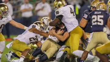 SAN DIEGO, CA - OCTOBER 27: Zach Abey #9 of the Navy Midshipmen runs with the ball scoring a touchdown in the 2nd half against the Notre Dame Fighting Irish at SDCCU Stadium on October 27, 2018 in San Diego, California. (Photo by Kent Horner/Getty Images)