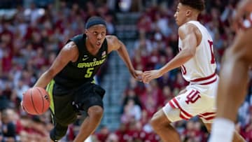 BLOOMINGTON, IN - MARCH 02: Cassius Winston #5 of the Michigan State Spartans dribbles the ball against Rob Phinisee #10 of the Indiana Hoosiers at Assembly Hall on March 2, 2019 in Bloomington, Indiana. (Photo by Michael Hickey/Getty Images)