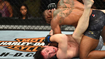 DALLAS, TX - SEPTEMBER 08: (R-L) Tyron Woodley elbows Darren Till of England in their UFC welterweight championship fight during the UFC 228 event at American Airlines Center on September 8, 2018 in Dallas, Texas. (Photo by Josh Hedges/Zuffa LLC/Zuffa LLC via Getty Images)