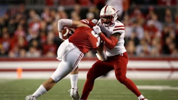 MADISON, WI - OCTOBER 06: Eric Lee Jr. #6 of the Nebraska Cornhuskers tackles Jake Ferguson #84 of the Wisconsin Badgers in the first quarter at Camp Randall Stadium on October 6, 2018 in Madison, Wisconsin. (Photo by Dylan Buell/Getty Images)