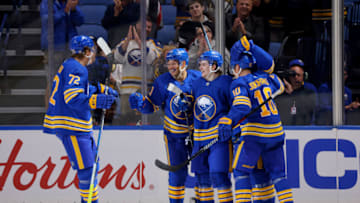 Sep 30, 2023; Buffalo, New York, USA; Buffalo Sabres left wing Zach Benson (9) celebrates his goal with teammates during the third period against the Columbus Blue Jackets at KeyBank Center. Mandatory Credit: Timothy T. Ludwig-USA TODAY Sports
