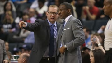 Toronto Raptors assistant coach Nick Nurse talks to head coach Dwane Casey Credit: Tom Szczerbowski-USA TODAY Sports