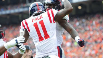 Oct 31, 2015; Auburn, AL, USA; Mississippi Rebels wide receiver Markell Pack (11) celebrates with wide receiver Laquon Treadwell (1) after Treadwell scored a touchdown during the fourth quarter against the Auburn Tigers at Jordan Hare Stadium. Mississippi won 27-19. Mandatory Credit: Shanna Lockwood-USA TODAY Sports
