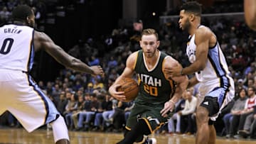 Dec 18, 2016; Memphis, TN, USA; Utah Jazz forward Gordon Hayward (20) drives to the basket between Memphis Grizzlies forward JaMychal Green (0) and Memphis Grizzlies guard Andrew Harrison (5) during the second half at FedExForum. the Utah Jazz defeat the Memphis Grizzlies 82-73. Mandatory Credit: Justin Ford-USA TODAY Sports