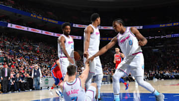 PHILADELPHIA,PA - FEBRUARY 14 : Goran Dragic #7 , Justise Winslow #20 and Josh Richardson #0 of the Miami Heat gather to help up Goran Dragic against the Philadelphia 76ers at Wells Fargo Center on February 14, 2018 in Philadelphia, Pennsylvania NOTE TO USER: User expressly acknowledges and agrees that, by downloading and/or using this Photograph, user is consenting to the terms and conditions of the Getty Images License Agreement. Mandatory Copyright Notice: Copyright 2018 NBAE (Photo by Jesse D. Garrabrant/NBAE via Getty Images)