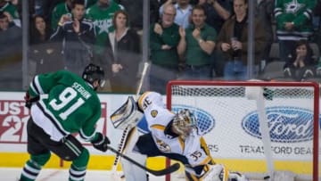 Apr 8, 2014; Dallas, TX, USA; Dallas Stars center Tyler Seguin (91) scores the game winning goal against Nashville Predators goalie Pekka Rinne (35) during the overtime shootout at the American Airlines Center. The Stars defeated the Predators 3-2 in the overtime shootout. Mandatory Credit: Jerome Miron-USA TODAY Sports