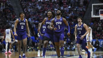 Mar 18, 2022; San Diego, CA, USA; TCU Horned Frogs guard Mike Miles (1) celebrates with his teammates against the Seton Hall Pirates during the first half during the first round of the 2022 NCAA Tournament at Viejas Arena. Mandatory Credit: Orlando Ramirez-USA TODAY Sports