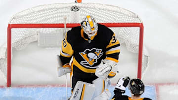 PITTSBURGH, PA - MARCH 10: Matt Murray #30 of the Pittsburgh Penguins celebrates with Marcus Pettersson #28 of the Pittsburgh Penguins after defeating the Boston Bruins at PPG Paints Arena on March 10, 2019 in Pittsburgh, Pennsylvania. (Photo by Joe Sargent/NHLI via Getty Images)