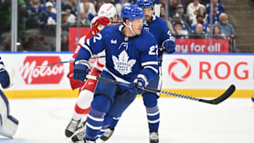 Oct 5, 2023; Toronto, Ontario, CAN; Toronto Maple Leafs defenseman Jake McCabe (22) pursues the play against the Detroit Red Wings in the second period at Scotiabank Arena. Mandatory Credit: Dan Hamilton-USA TODAY Sports