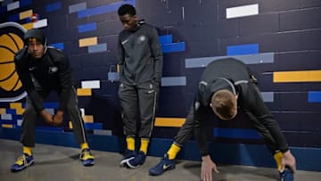 INDIANAPOLIS, IN - APRIL 22: Myles Turner #33 Victor Oladipo #4 Domantas Sabonis #11 of the Indiana Pacers stretch prior to Game Four of Round One of the 2018 NBA Playoffs against the Cleveland Cavaliers on April 22, 2018 at Bankers Life Fieldhouse in Indianapolis, Indiana. NOTE TO USER: User expressly acknowledges and agrees that, by downloading and or using this Photograph, user is consenting to the terms and conditions of the Getty Images License Agreement. Mandatory Copyright Notice: Copyright 2018 NBAE (Photo by David Dow/NBAE via Getty Images)