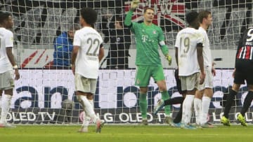 Bayern Munich's German goalkeeper Manuel Neuer (C) and his teammates react after Frankfurt scored the 4-1 during the German first division Bundesliga football match between Eintracht Frankfurt and FC Bayern Munich on November 2, 2019 in Frankfurt am Main, western Germany. (Photo by Daniel ROLAND / AFP) / DFL REGULATIONS PROHIBIT ANY USE OF PHOTOGRAPHS AS IMAGE SEQUENCES AND/OR QUASI-VIDEO (Photo by DANIEL ROLAND/AFP via Getty Images)