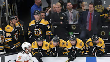 BOSTON - NOVEMBER 12: Florida Panthers' Mike Hoffman (68), who had just beat Bruins goalie Tuukka Rask (not pictured) in the shootout, skates past a glum Boston Bruins bench. His goal would turn out to be the game winner. The Boston Bruins host the Florida Panthers in a regular season NHL hockey game at TD Garden in Boston on Nov. 12, 2019. (Photo by Jim Davis/The Boston Globe via Getty Images)