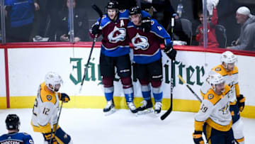 DENVER, CO - APRIL 16: Nathan MacKinnon (29) of the Colorado Avalanche celebrates his 3-0 goal with teammate Tyson Barrie (4) as Mike Fisher (12) of the Nashville Predators, Roman Josi (59) and Miikka Salomaki (20) react during the first period on Monday, April 16, 2018. The Colorado Avalanche hosted the Nashville Predators. (Photo by AAron Ontiveroz/The Denver Post via Getty Images)