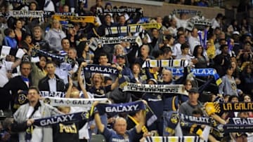September 21, 2013; Carson, CA, USA; Los Angeles Galaxy fans in attendance cheer against the Seattle Sounders during the first half at StubHub Center. Mandatory Credit: Gary A. Vasquez-USA TODAY Sports