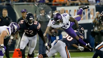 CHICAGO, IL - OCTOBER 09: Jerick McKinnon #21 of the Minnesota Vikings is hit by Adrian Amos #38 of the Chicago Bears in the second quarter at Soldier Field on October 9, 2017 in Chicago, Illinois. (Photo by Jon Durr/Getty Images)