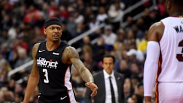 Bradley Beal #3 of the Washington Wizards reacts to Dwyane Wade #3 (Photo by Will Newton/Getty Images)