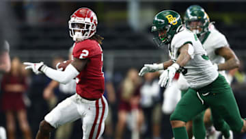 Dec 7, 2019; Arlington, TX, USA; Oklahoma Sooner receiver CeeDee Lamb (2) runs with the ball after a reception against Baylor Bears linebacker Jordan Williams (38) in the 2019 Big 12 Championship Game at AT&T Stadium. Mandatory Credit: Matthew Emmons-USA TODAY Sports